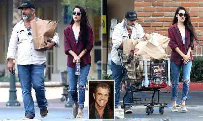 Mel, is that you? Actor Gibson, 62, looks UNRECOGNISABLE as he goes grocery shopping with girlfriend Rosalind Ross, 27, in Malibu