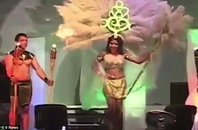 Terrifying moment a beauty pageant contestant's elaborate costume catches fire