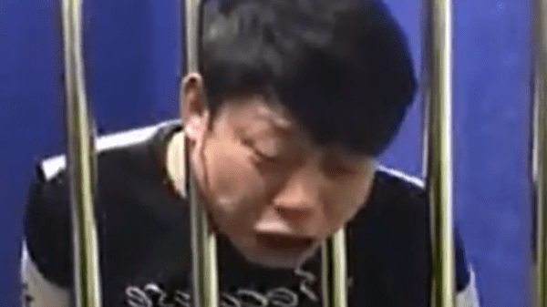 Man gets head stuck in bars during interrogation at police st
