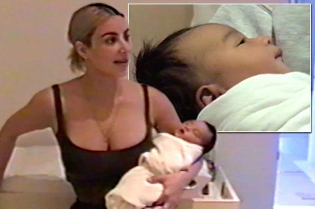 Kim Kardashian and Kanye West's newborn daughter Chicago is seen for the FIRST TIME