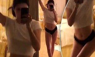 Gotta go to bed': Kendall Jenner flaunts her impossibly lean figure in undies and T-shirt... after confirming she is dating Blake Griffin