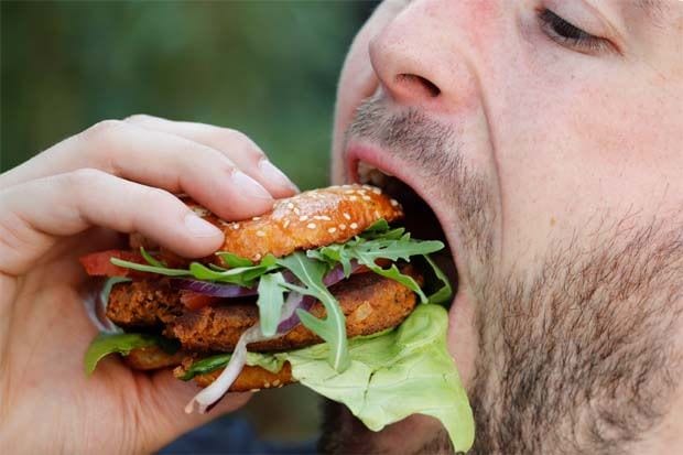 German shoppers sample burgers made of buffalo worms