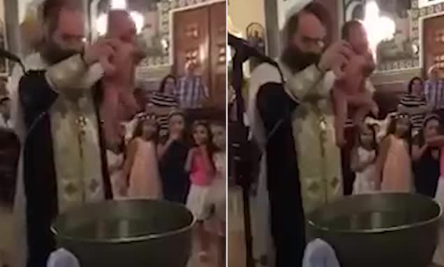 Greek Orthodox bishop violently dunks baby in water during baptism
