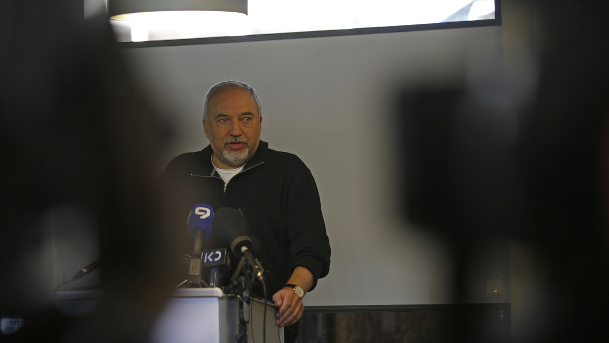Israeli Defence Minister Avigdor Lieberman speaks during the inauguration of an underground military operation centre in the Israeli settlement of Katzrin in the Golan Heights on April 10, 2018. Israeli Defence Minister Avigdor Lieberman said a soldier who shot a Palestinian along the Gaza border in a video that has been widely shared "deserves a medal". / AFP PHOTO / JALAA MAREY