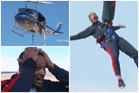 Will Smith dives into his 50th birthday by bungee jumping out of a helicopter over the Grand Canyon