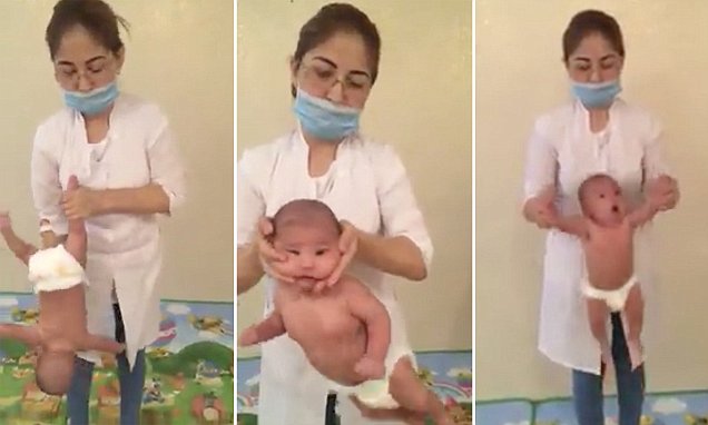 SHOCKING VIDEO SHOWS WOMAN SWING AND SPIN A BABY BY THE ARMS, ANKLES AND HEAD FOR A HEALING ëBABY MASSAGEí