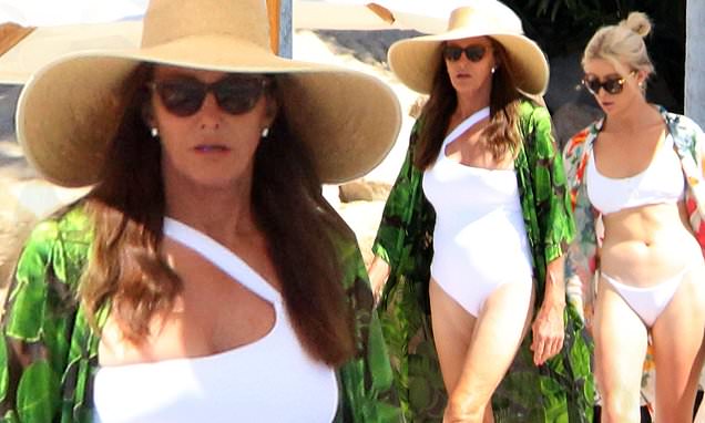 Caitlyn Jenner rocks white swimsuit as she celebrates 69th birthday with bikini-clad Sophia Hutchins