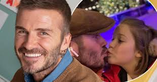 David Beckham shares kiss with daughter Harper as they enjoy ice skating trip