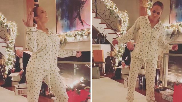 Jennifer Lopez, 49, poses with mini-me daughter Emme, 10, on Christmas as they wear matching pajamas... after she gifts A-Rod $40K worth of LV luggage