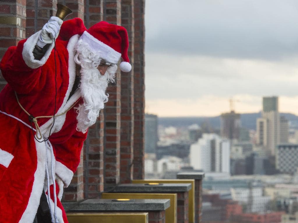 Santa swaps the chimney for an abseil in Berlin