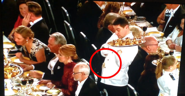 Waiter accidentally drops food on Dan Larhammar at the Nobel banquet 2018