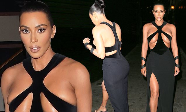 Kim Kardashian shocks in outrageous vintage '98 Thierry Mugler gown with restrictive cut-out sections at the cleavage to attend beauty awards