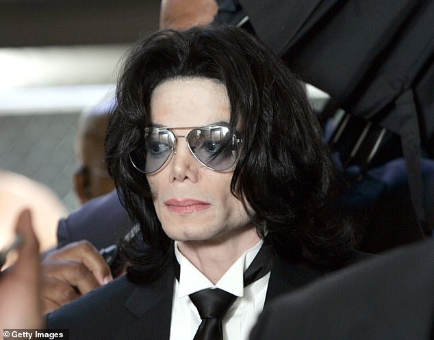 'They told me they would slice my neck': Michael Jackson's people 'threatened to kill his maid if she went public with sex abuse claims about the King of Pop'