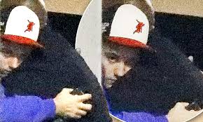 Justin Bieber hugs his bodyguard after getting back from solo spiritual retreat following the release of Selena Gomez's break-up track