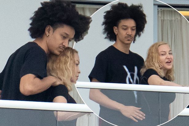 Madonna, 61, cozies up to dancer 'boyfriend' Ahlamalik Williams, 26, while with daughter Lourdes, 23, and her mystery man