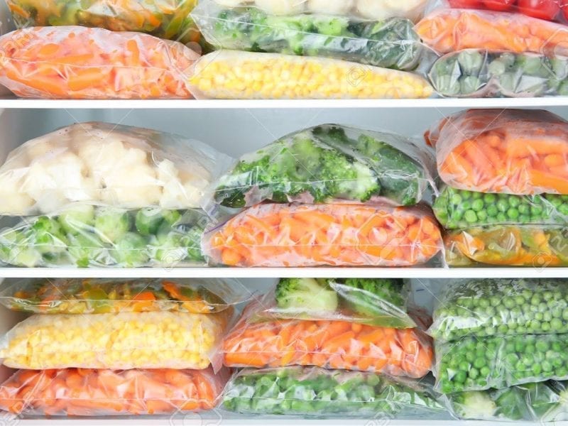 plastic-bags-with-deep-frozen-vegetables-in-refrigerator