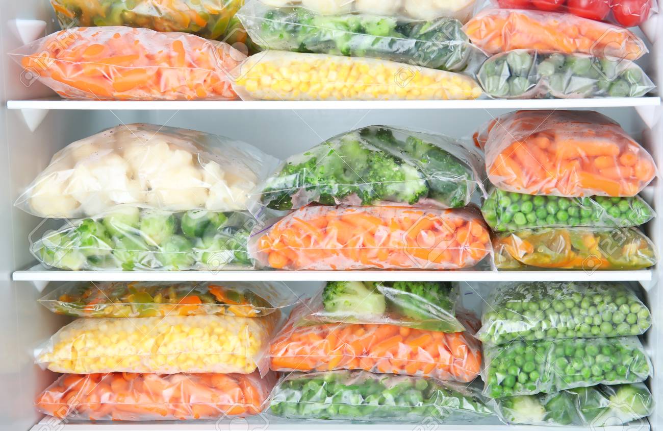 plastic-bags-with-deep-frozen-vegetables-in-refrigerator