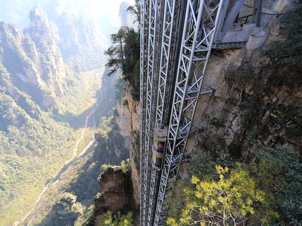 Striking aerial pictures show China's 1,070-foot-tall glass elevator built on the side of a cliff